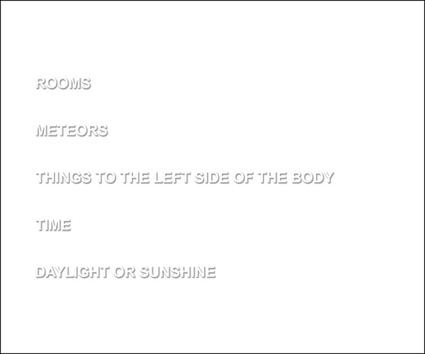 a white card with embossed text which reads rooms meteors things to the left side of the body time daylight or sunshine
